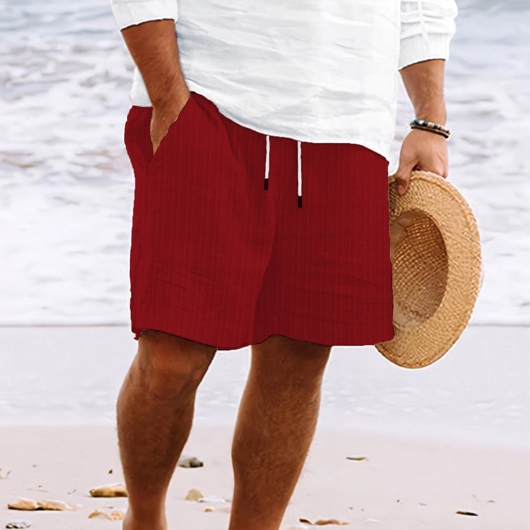 Practical men's relaxed fit drawstring shorts with pockets, ideal for everyday casual summer wear.