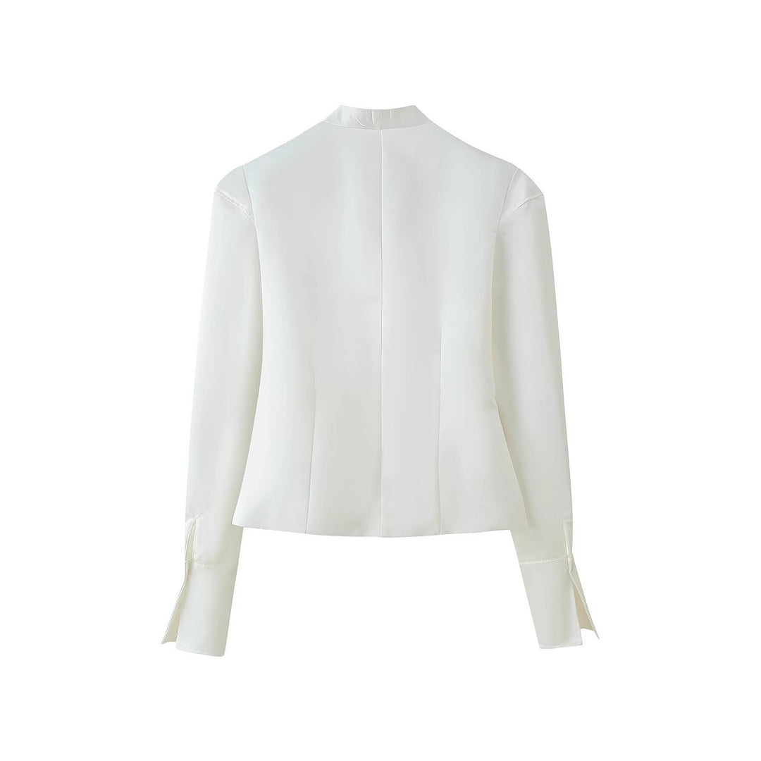 Chic white women's long sleeve blazer, perfectly tailored for sophisticated business attire.