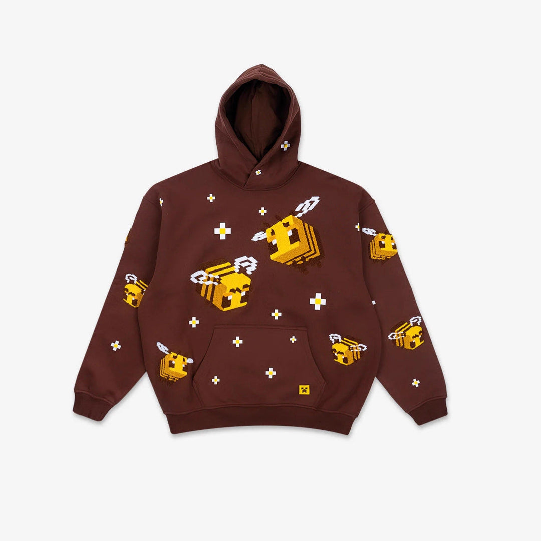 Light brown women's hoodie with a unique creative bee graphic design, perfect for chic & cozy casual wear.