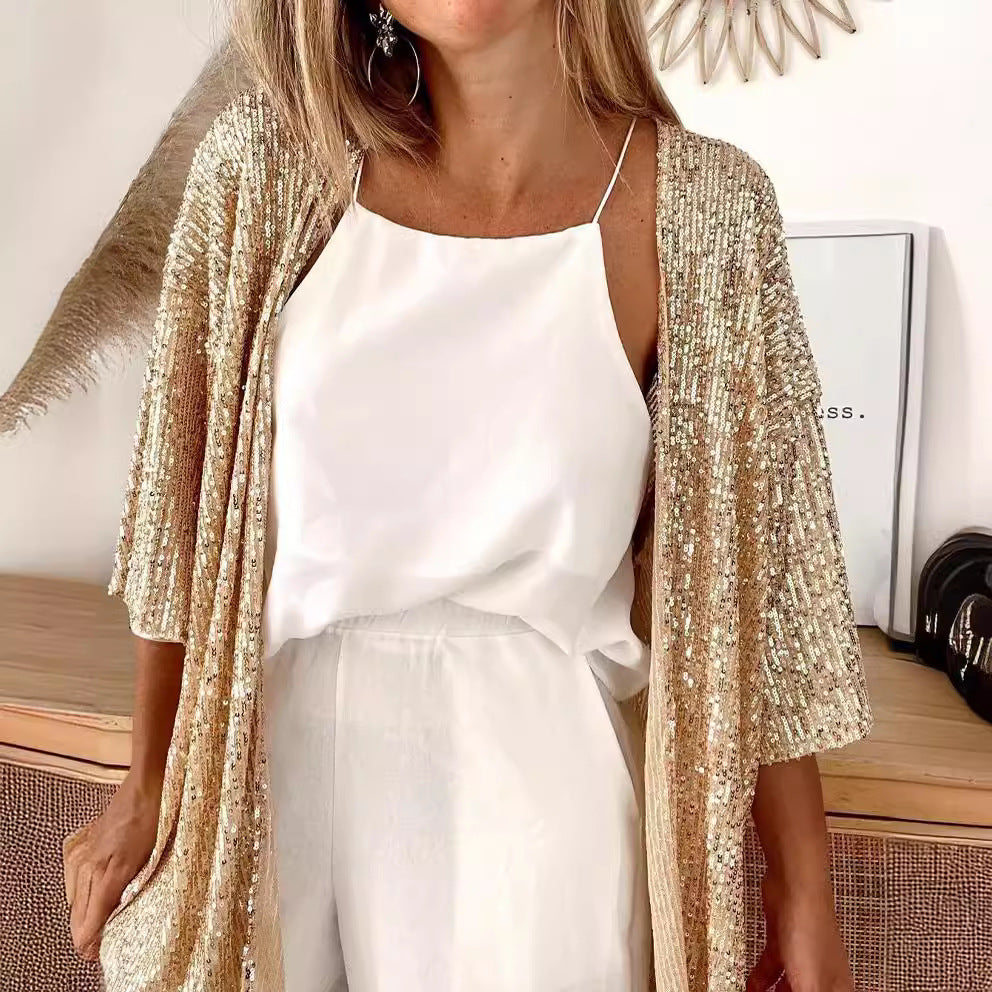 Elegant evening jacket: women's sequin cardigan with a glamorous sparkle and loose fit.