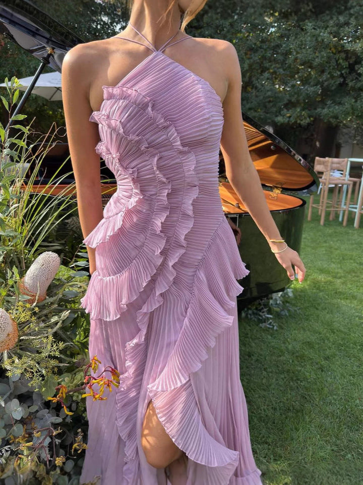 Back view of a graceful white flowy ruffle dress, an elegant sleeveless women's charming dress.