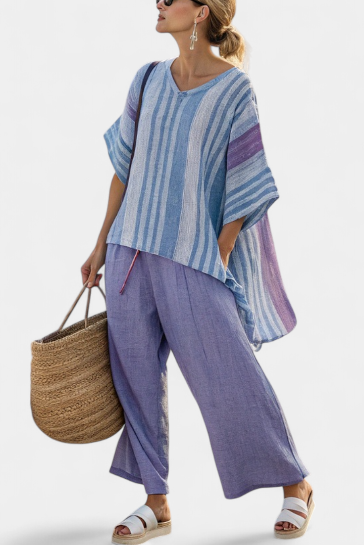 Elegant women's lavender & sky blue striped outfit set with relaxed fit top and wide-leg pants for summer style.