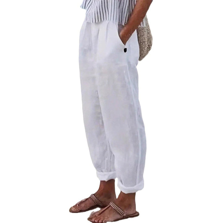 Stylish women's wide leg cropped pants in white. Elastic waist, flowy & perfect for warm weather.