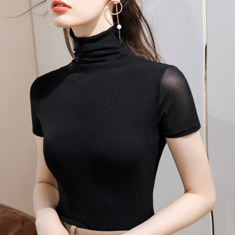 Front view: Elegant women's short sleeve turtleneck top, perfect for spring/summer.