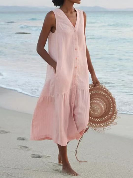 Casual women's vacation dress. This comfortable, flowy midi dress with pockets is great for summer adventures.