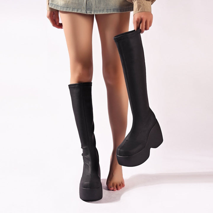 Ergonomic women's high-performance platform boots, comfortable non-slip design for active wear.