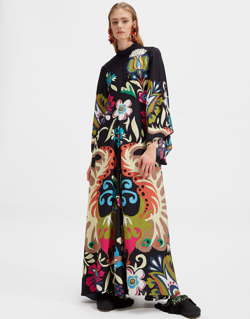 Flowy A-line women's elegant dress, three-quarter sleeves, vibrant print. Perfect for various occasions.