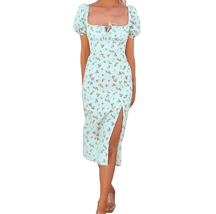 Stylish spring/summer floral midi dress. Women's elegant puff sleeve design, perfect for casual or party wear.