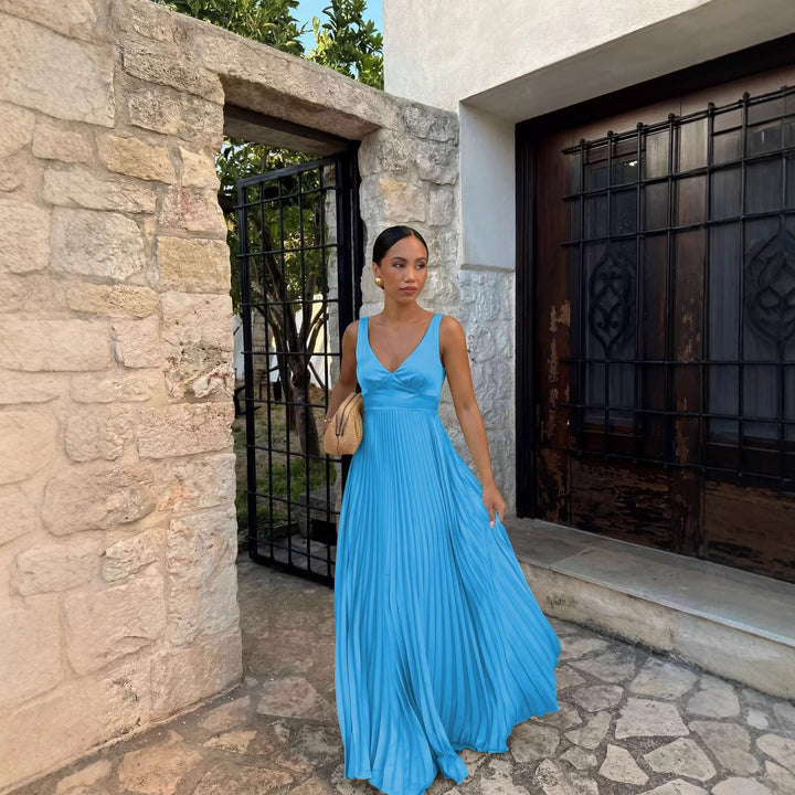 Fashionable women's pleated V-neck summer dress. A versatile midi length for elegant occasions.