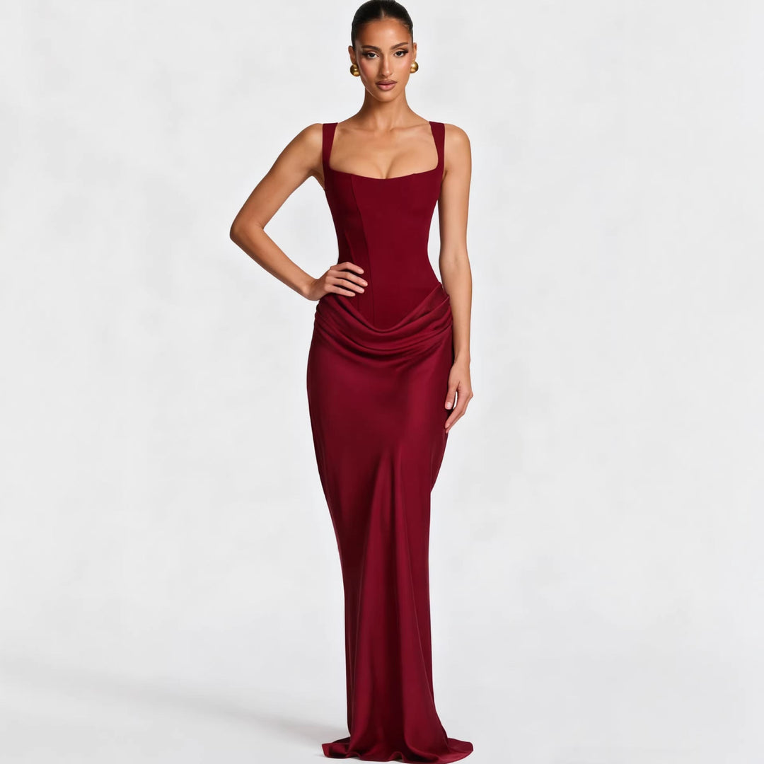 Smooth black bodycon dress for women, offering a sleek figure-hugging fit & square neckline, ideal for elegant parties.