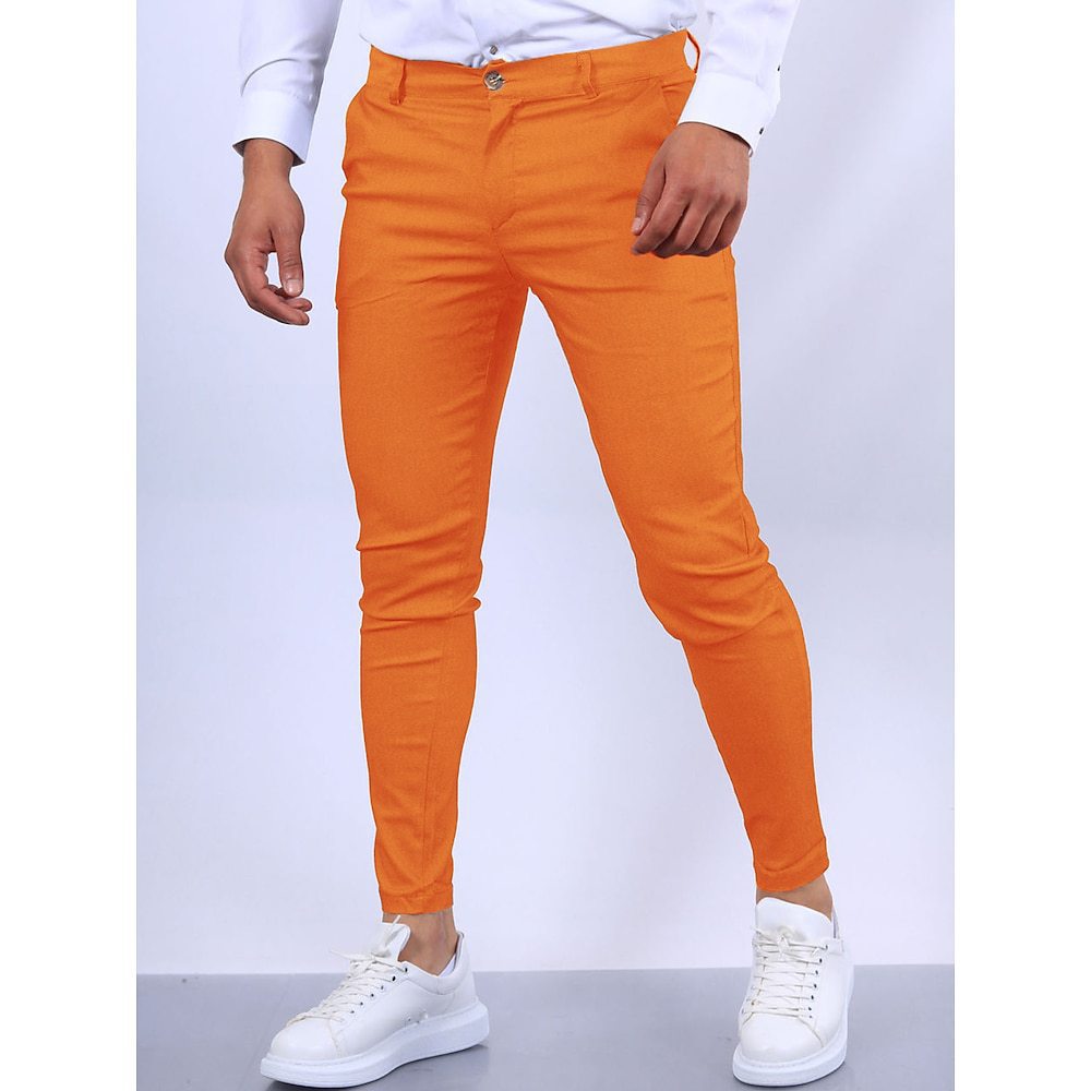 Tapered leg opening of men's slim-fit stretch chinos, designed for a neat, modern silhouette.