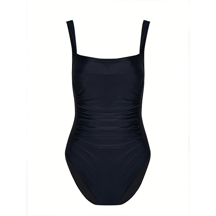 Stylish black one-piece square neck monokini swimsuit for women. Flattering resort & beachwear.