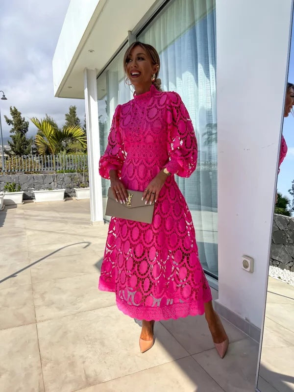Graceful women's evening gown, elegant long sleeve design with a flowing silhouette for special events.