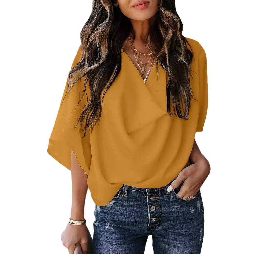 Versatile women's blouse, elegant V-neck and draped design with loose sleeves, great for office or casual.