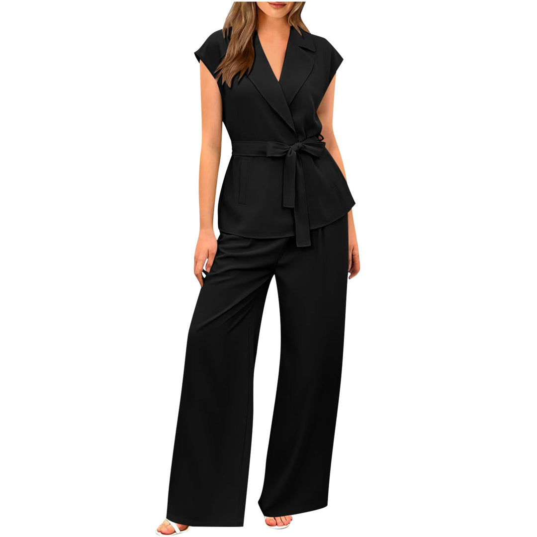Black women's tailored blazer and matching trousers. This elegant summer suit offers versatility & comfort.
