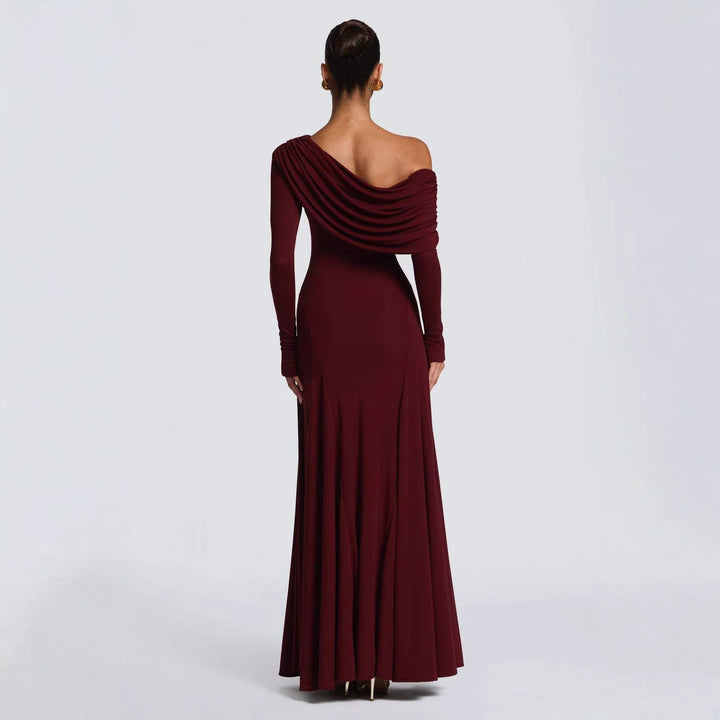 Chic women's formal maxi dress, long sleeve with elegant asymmetrical draping, ideal for wedding guests & events.