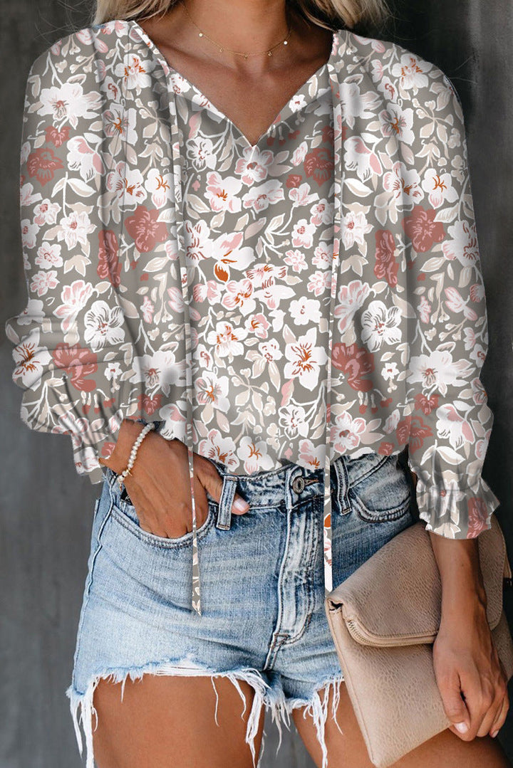 Comfortable women's ruffle V-neck summer top, lightweight and fashionable.