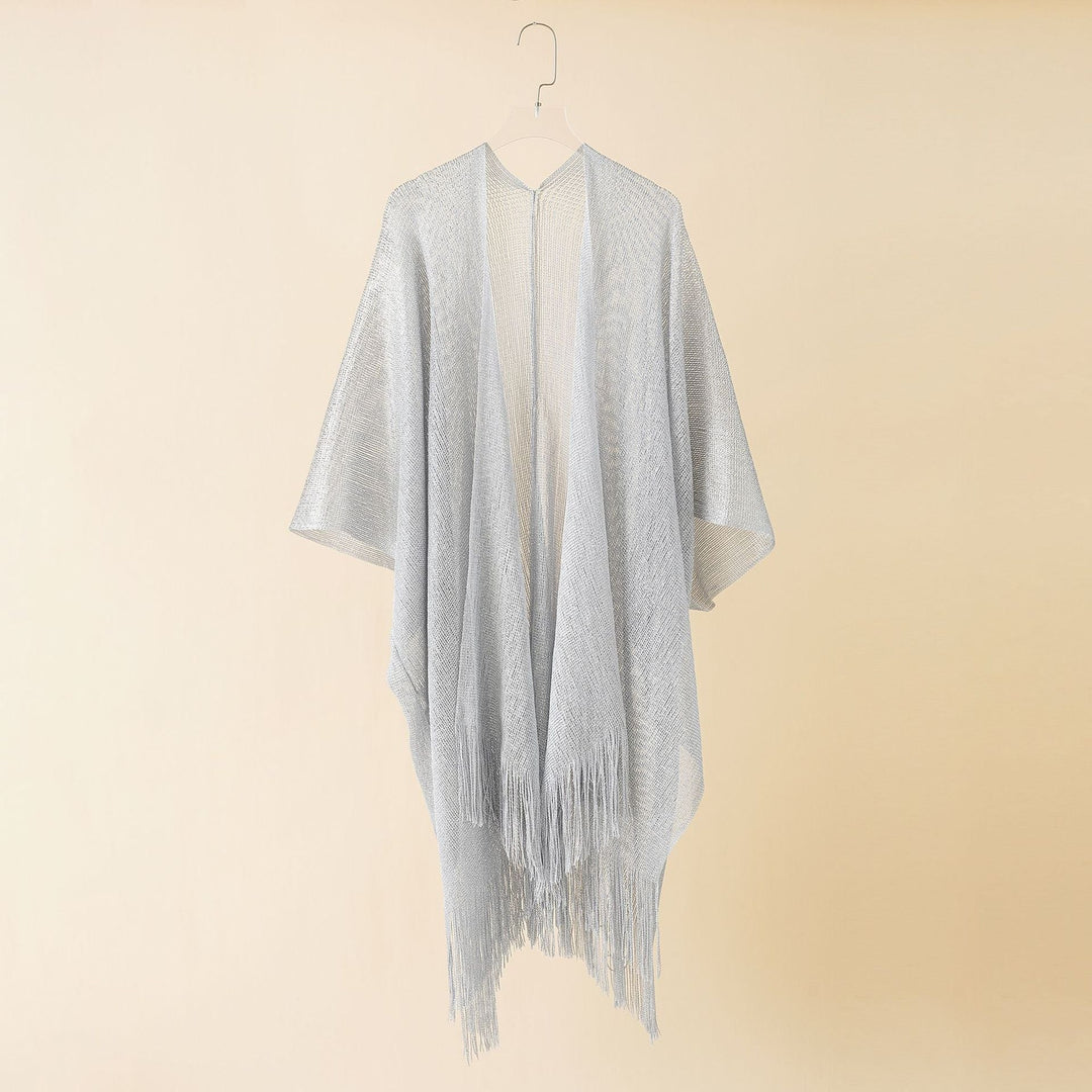 Stylish women's fringe kimono, a versatile and flowy cover-up for sunny days.