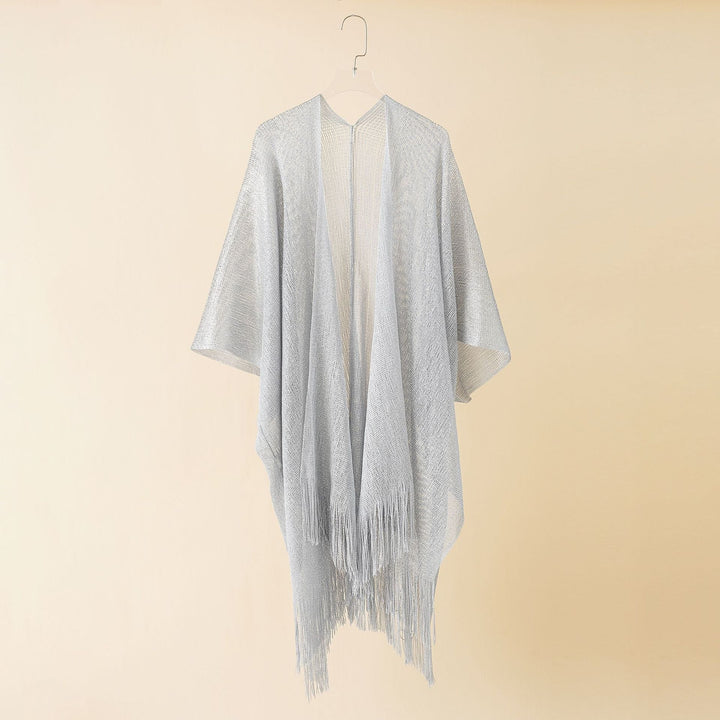 Stylish women's fringe kimono, a versatile and flowy cover-up for sunny days.