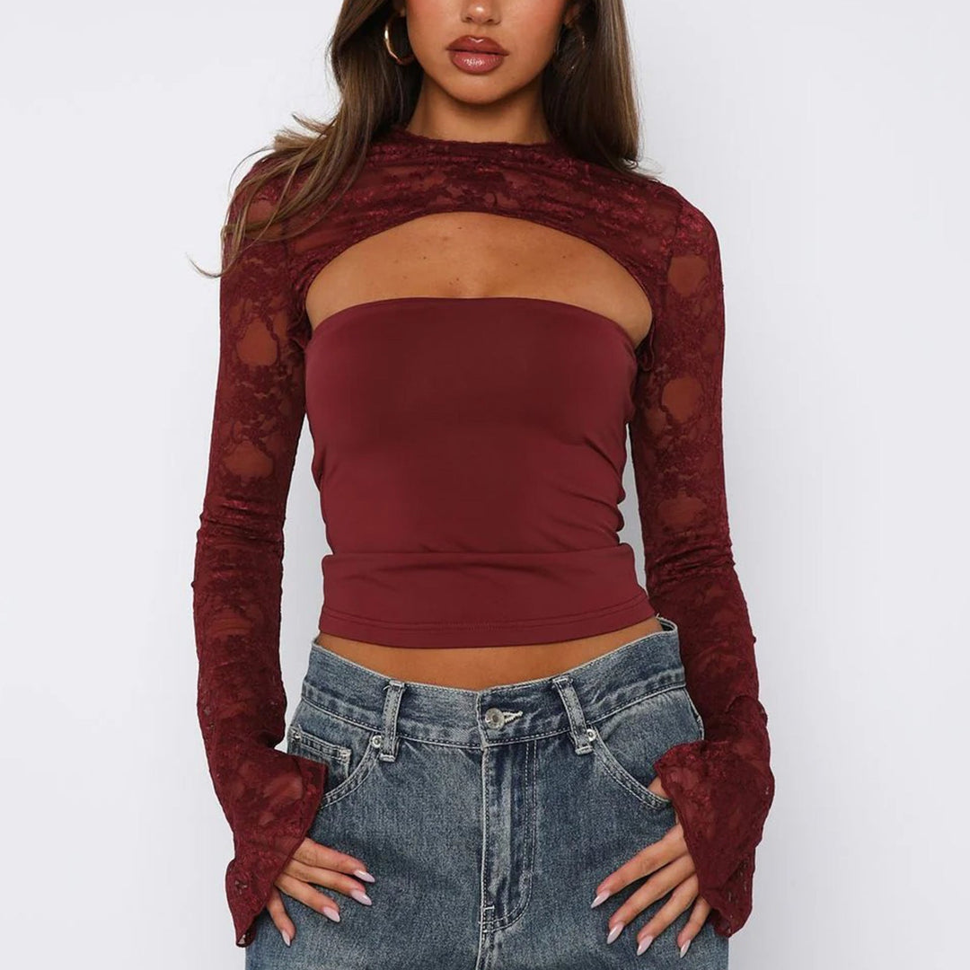 Modern women's fitted lace top with long sleeves and chic cut-out details, ideal for party evenings.