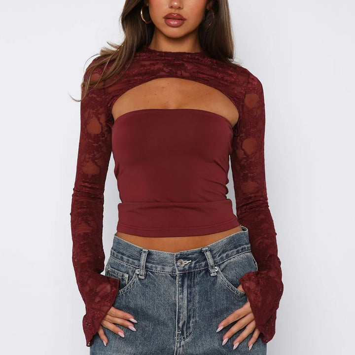Modern women's fitted lace top with long sleeves and chic cut-out details, ideal for party evenings.