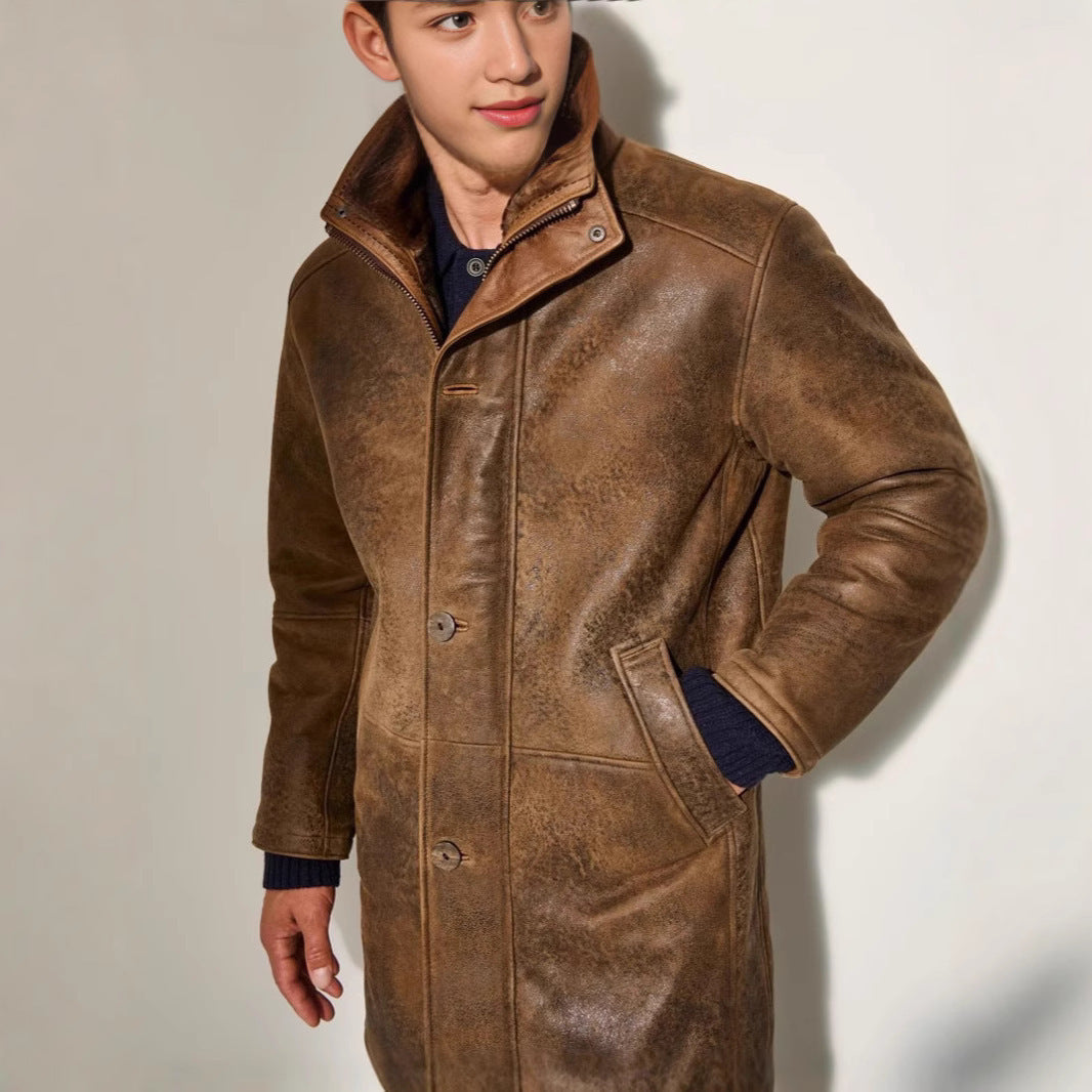 Stylish men's premium brown long winter coat. Elegant and warm outerwear for cold weather fashion.