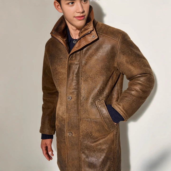 Stylish men's premium brown long winter coat. Elegant and warm outerwear for cold weather fashion.