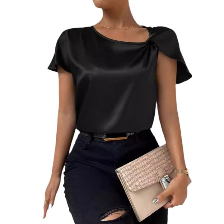 Women's fashion solid t-shirt top with a chic twist, round neck, and comfortable short sleeves.