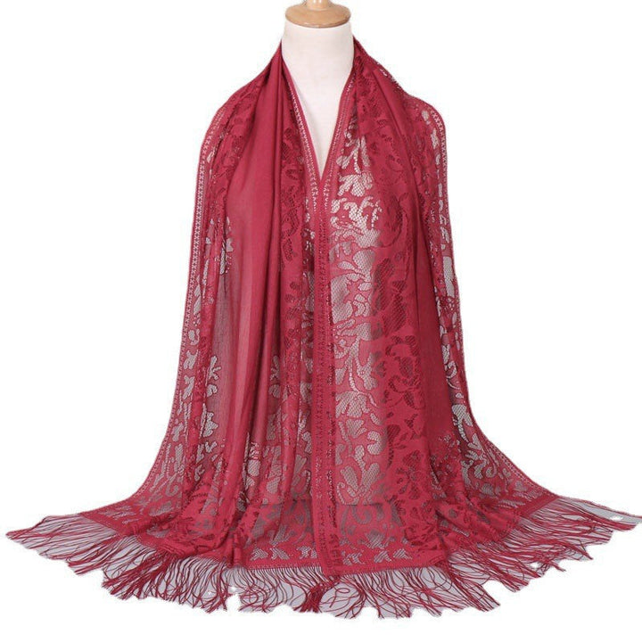 Soft lace floral scarf with fringes, an elegant women's accessory for versatile styling.