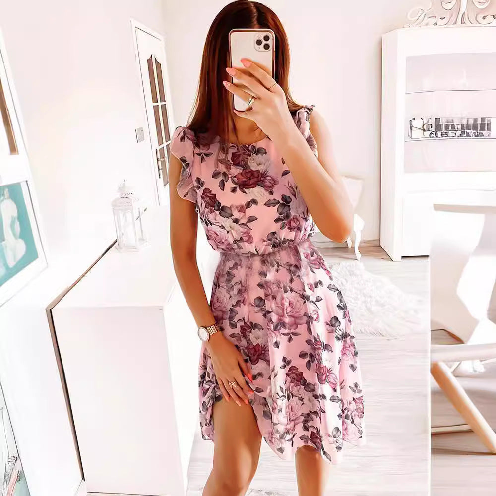 Casual women's floral midi dress featuring stylish ruffle sleeves, ideal for relaxed summer days or vacation wear.