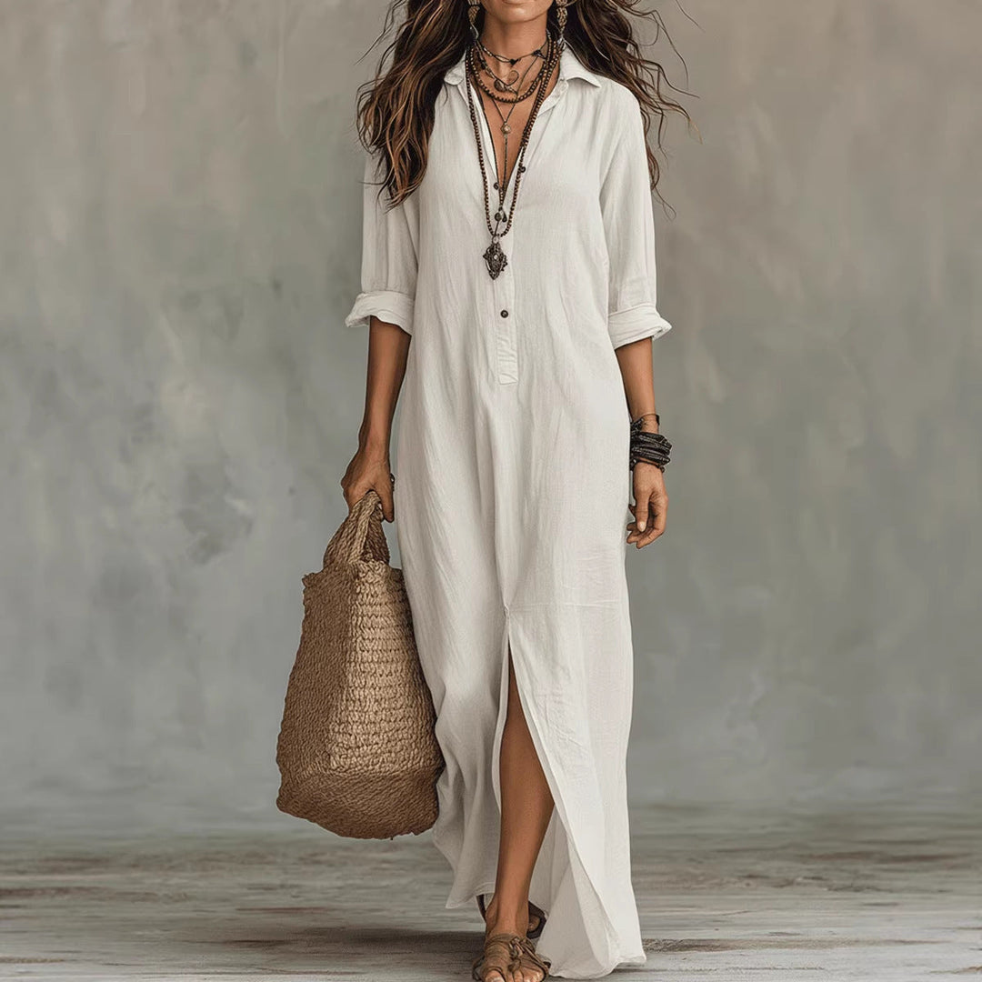 Casual women's long button-down shirt dress featuring a flowy design and fashionable side slit. Great for summer style.