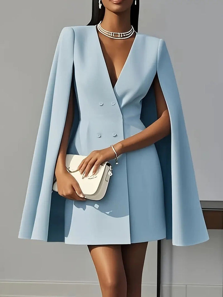 Sophisticated women's formal mini dress, featuring a unique cape blazer style. Elegant party wear.