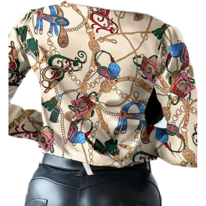 Women's artistic print button-up blouse with long sleeves, offering a casual yet elegant look.