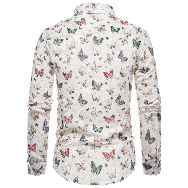 Close-up of a men's statement long sleeve shirt, showcasing a vibrant, detailed butterfly pattern.