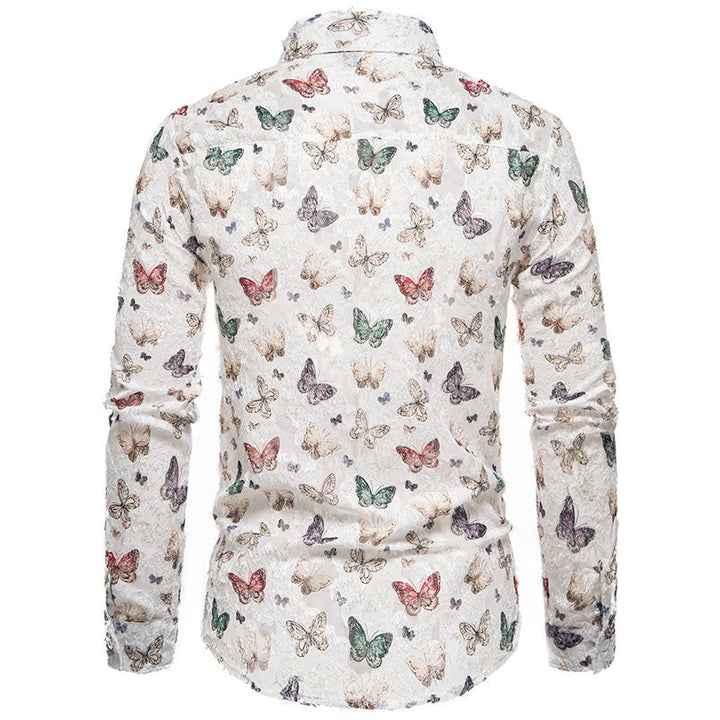 Close-up of a men's statement long sleeve shirt, showcasing a vibrant, detailed butterfly pattern.
