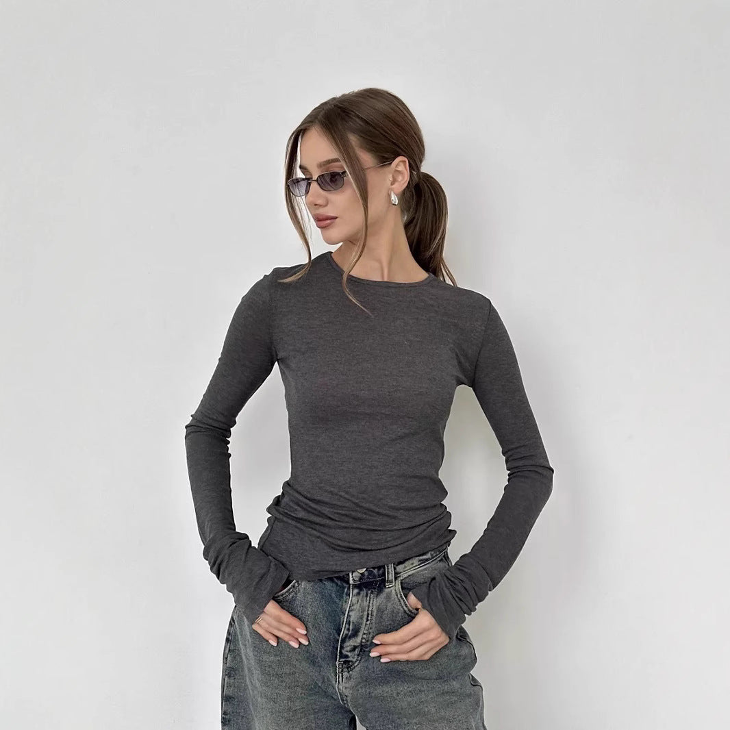 Wardrobe essential women's long sleeve t-shirt. Elegant casual top, crew neck, perfect for versatile seasonal style.