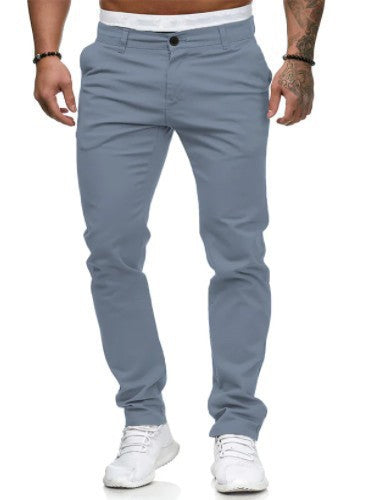 Men's formal slim-fit stretch trousers worn with a shirt, ideal for smart-casual events & menswear.