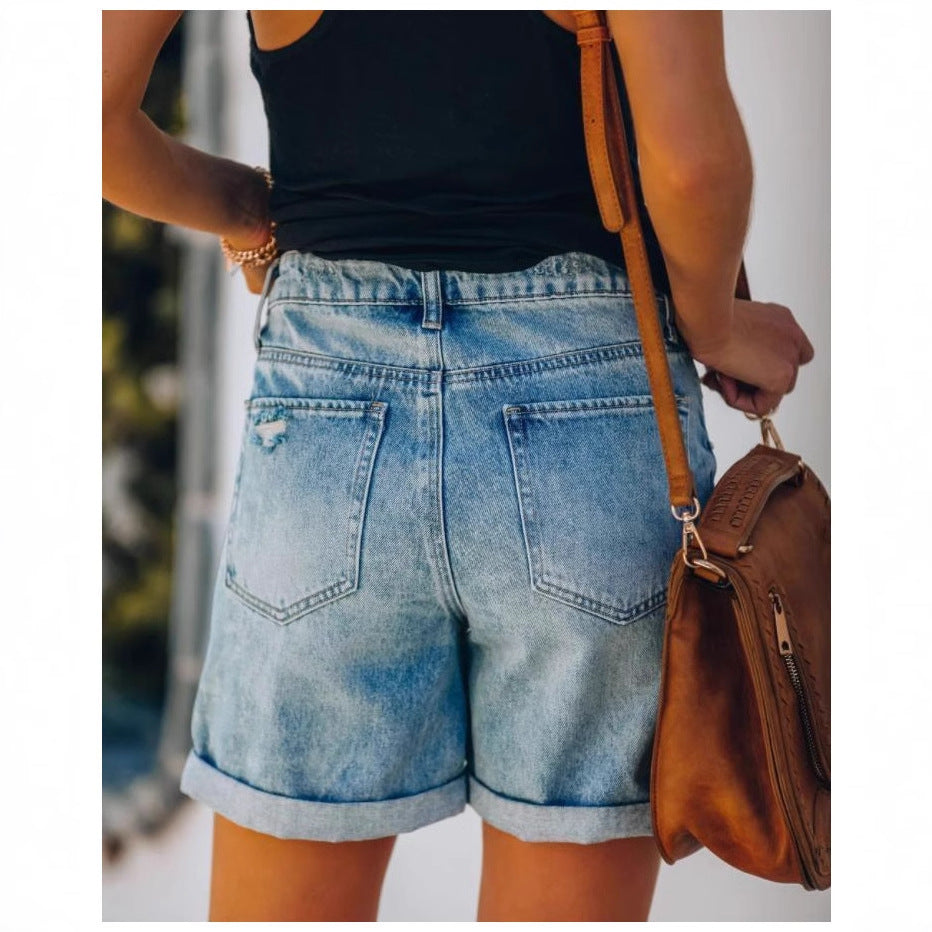 Everyday women's light blue distressed denim shorts with a flattering rolled hem for summer fashion.