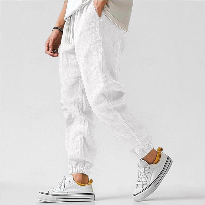 Men's relaxed fit casual pants with elastic waist & drawstring for ultimate comfort.