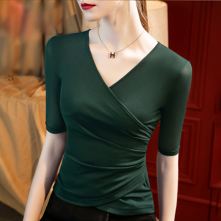 Versatile women's elegant wrap top. Half sleeves, V-neck & flattering draped design. Perfect for feminine office wear.