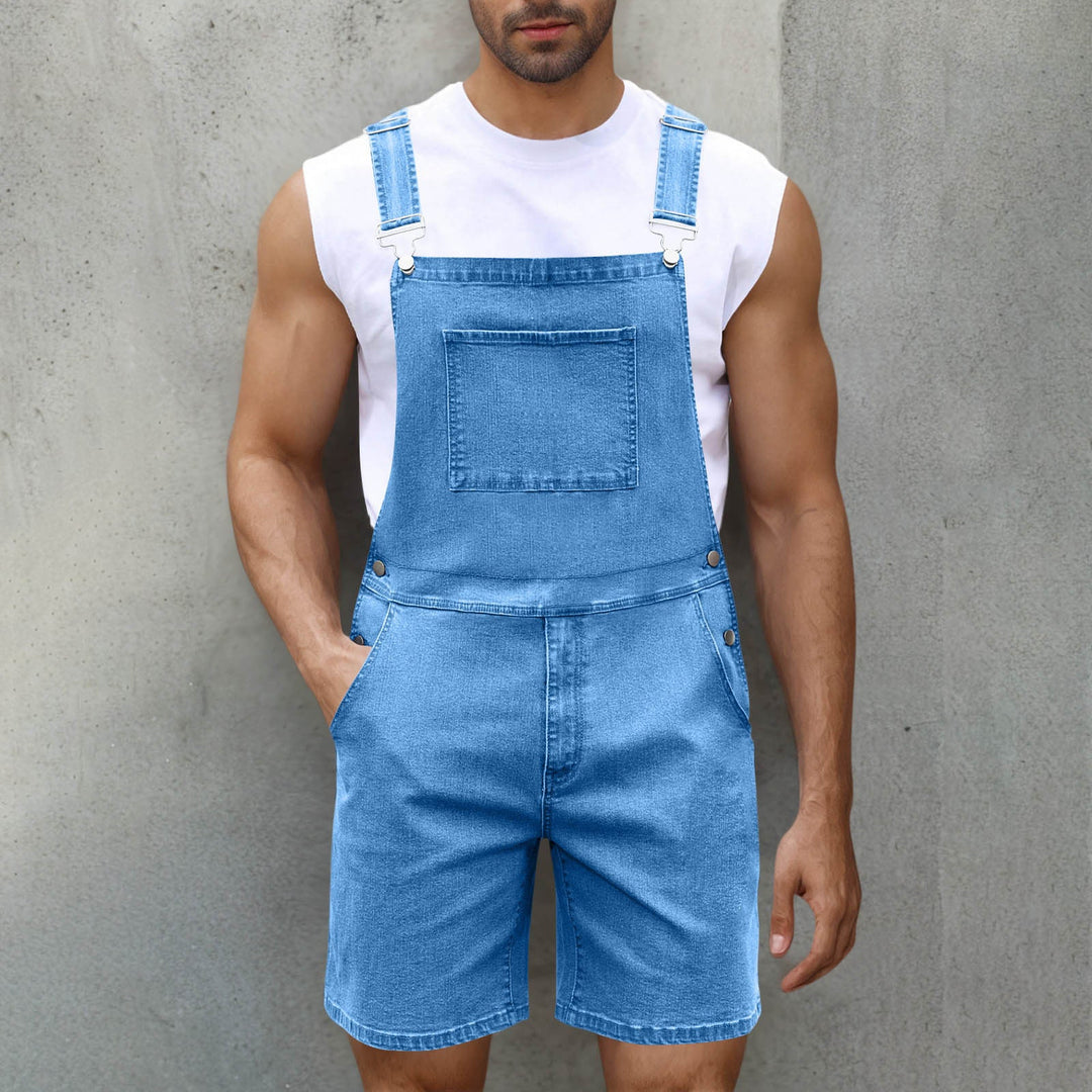 Man wearing fashionable men's overalls. Casual jumpsuit with adjustable straps, suitable for daily wear.