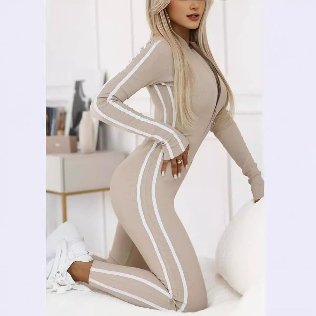 Sleek women's long sleeve striped athletic bodysuit, perfect for activewear and leisure.