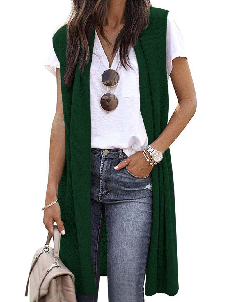 Woman modeling an elegant long casual vest, showcasing its flowing silhouette and sleeveless design.