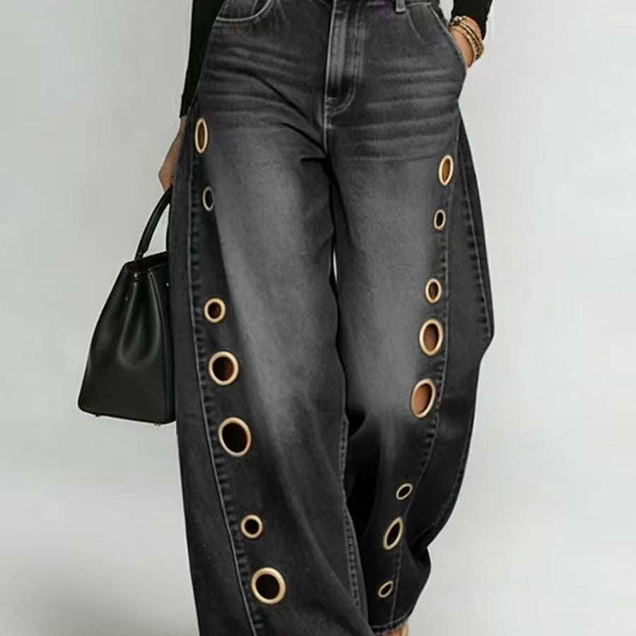 Stylish wide-leg denim jeans for women, featuring a high waist and unique decorative eyelets.