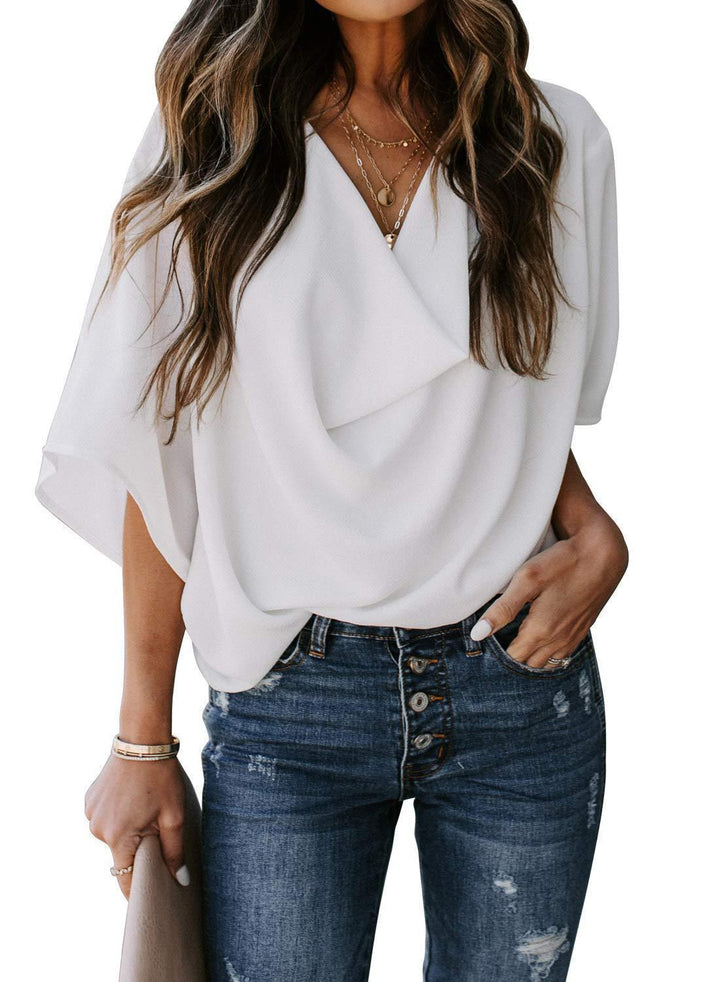 Modern women's elegant blouse, deep V-neck and flowing loose sleeves, a chic draped top for everyday fashion.