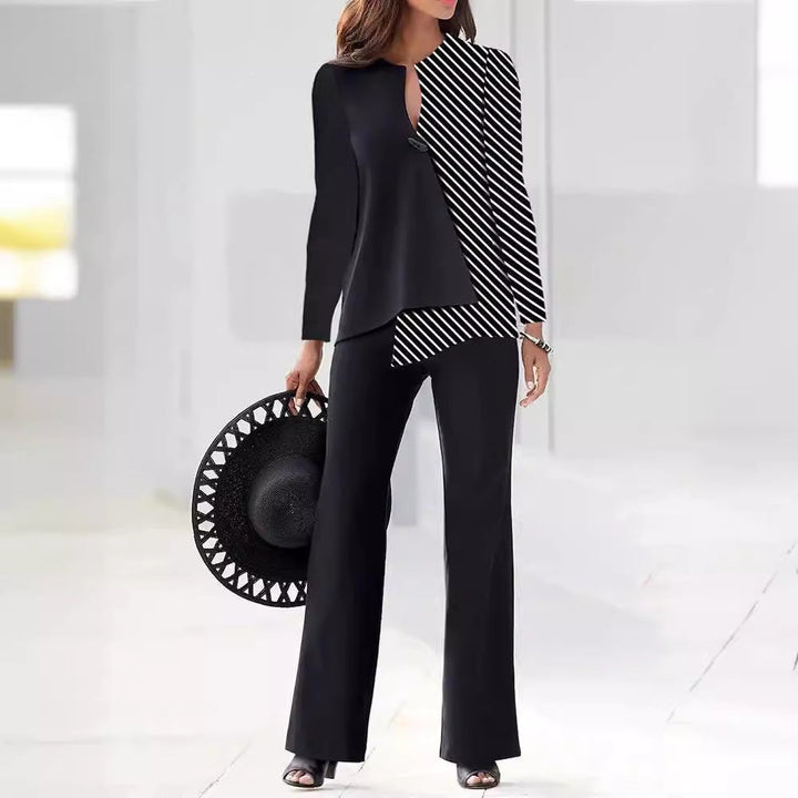 Chic women's two-piece pant suit set with asymmetrical top, versatile for work or stylish events.