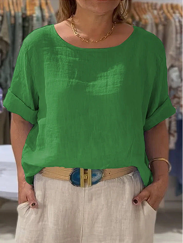 Versatile women's lightweight blouse, rolled sleeves, relaxed fit. Great for various casual styles.