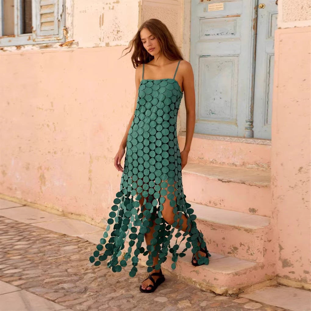 Chic women's crochet maxi dress. Intricate crochet detail and flowy fabric for elegant summer style.