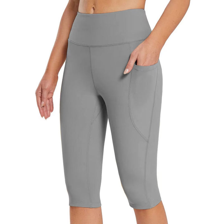 Sporty women's running capri pants, high-waist with essential side pockets.
