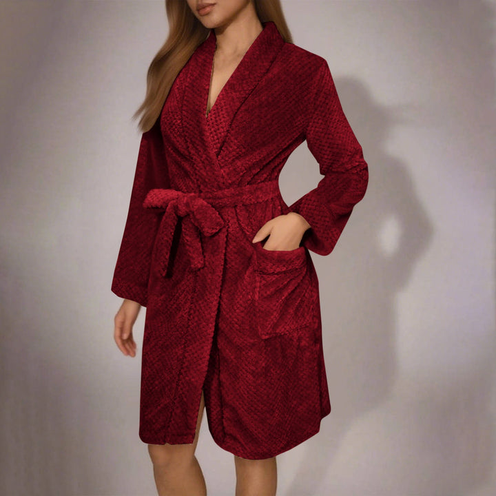 Plush women's dressing gown, belted, with pockets. Soft loungewear for relaxation.